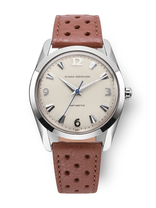 Watch with brown leather strap and beige dial on a white background