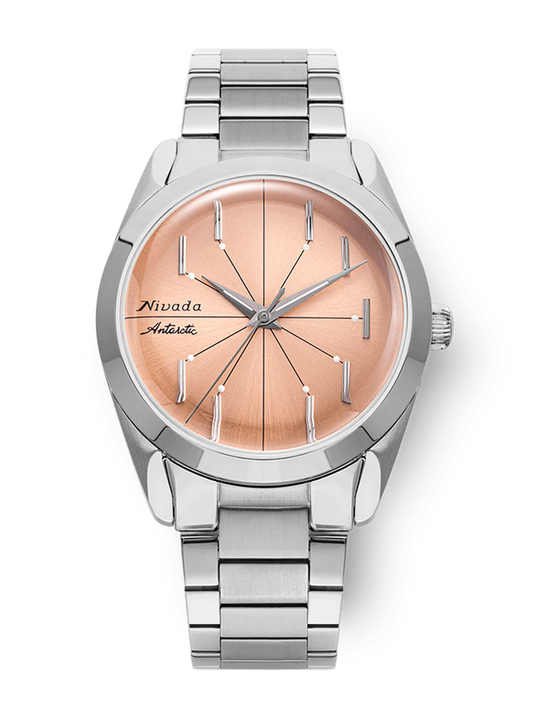 Silver watch with a rose gold face on a white background Nivada Grenchen Antarctic Spider